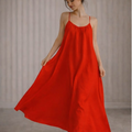 Woman wearing a red slip dress in two different settings.