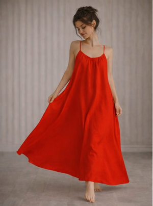 Woman wearing a red slip dress in two different settings.